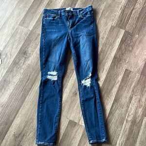Paige skinny jeans size 28. Dark color distressed in the knees.